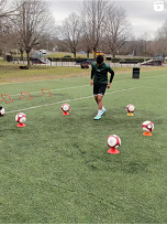 Coach and player reviewing skills